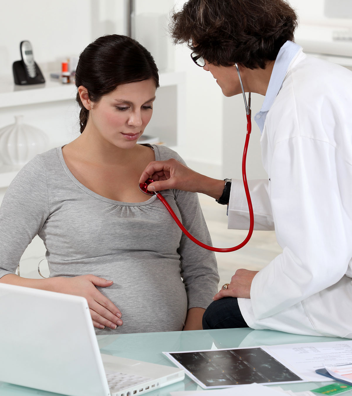 Doctor Checking Pregnant Women Fast Heart Beat