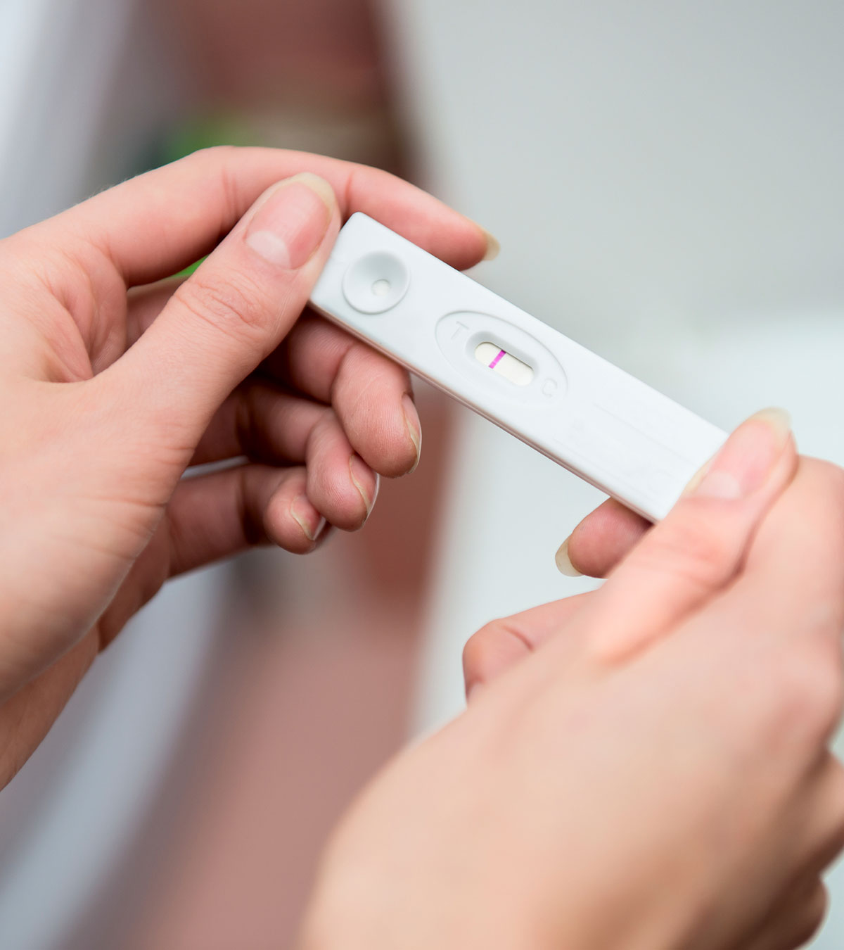 Women Checking Dollar Store Pregnancy Test