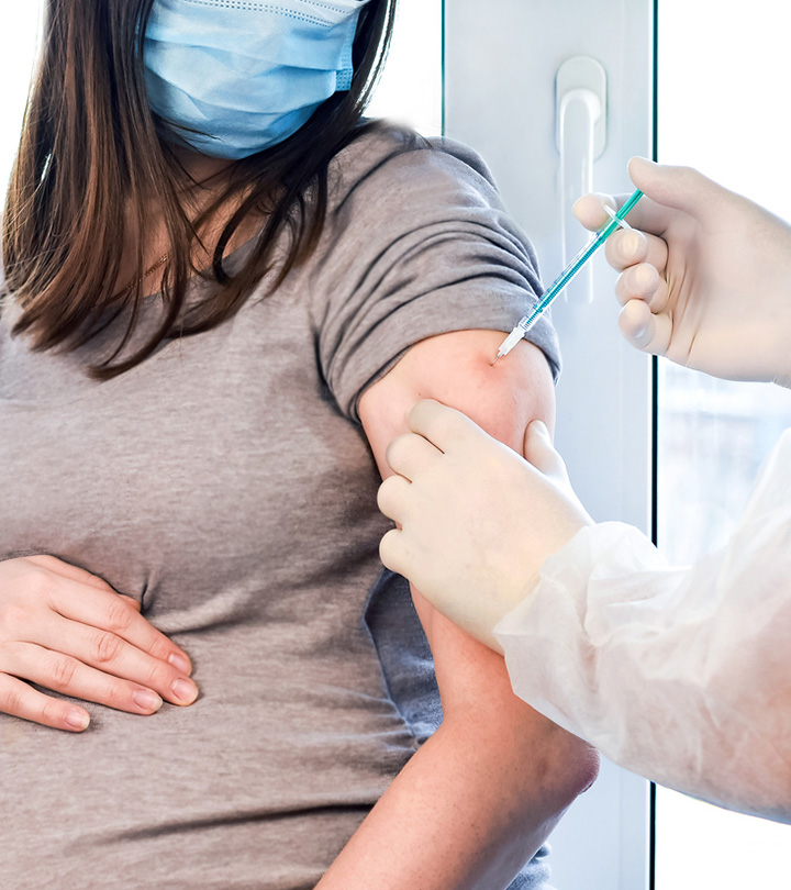 Pregnant woman consulting her doctor about HPV symptoms and risks