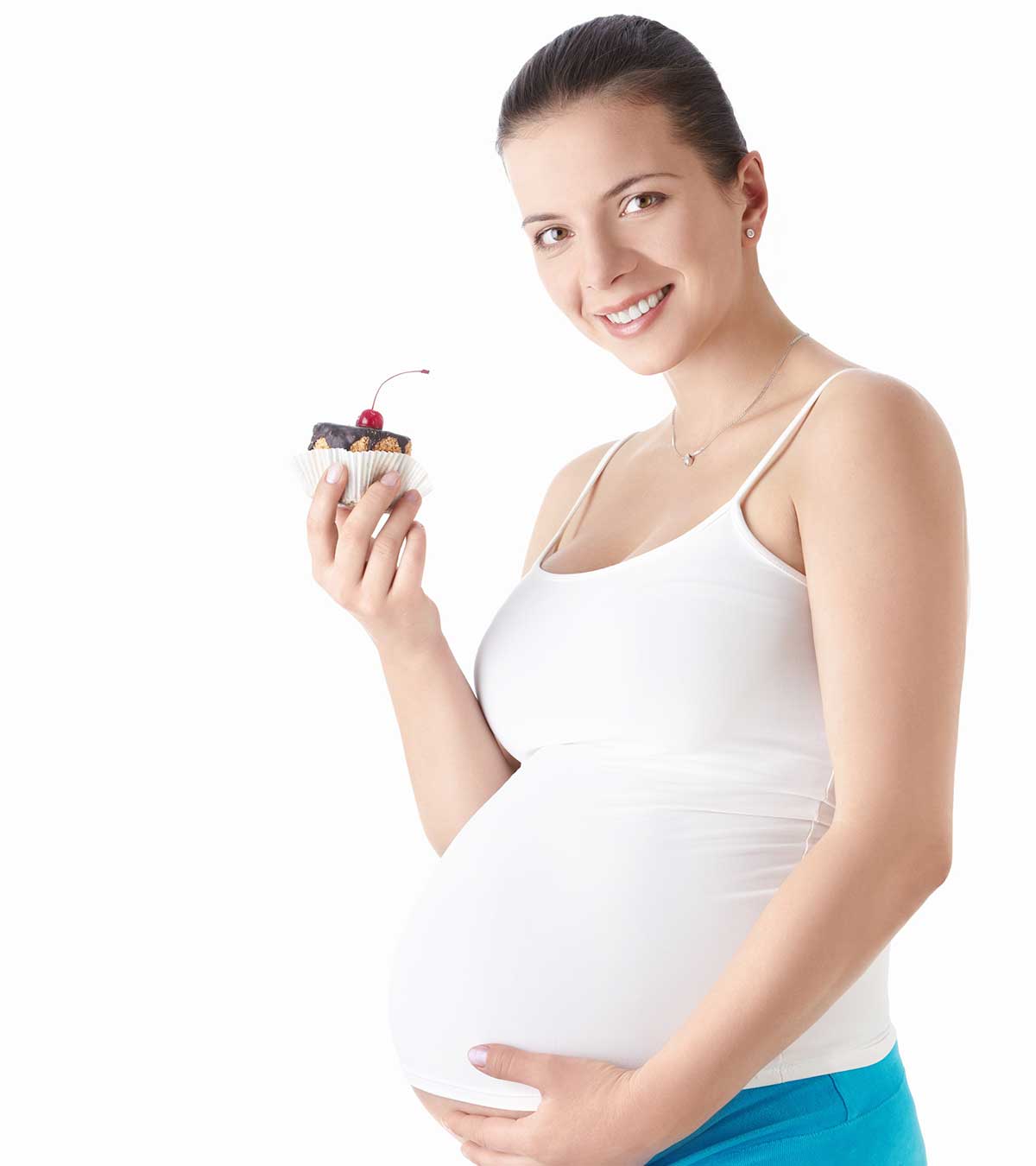 A woman is ready to eat cake