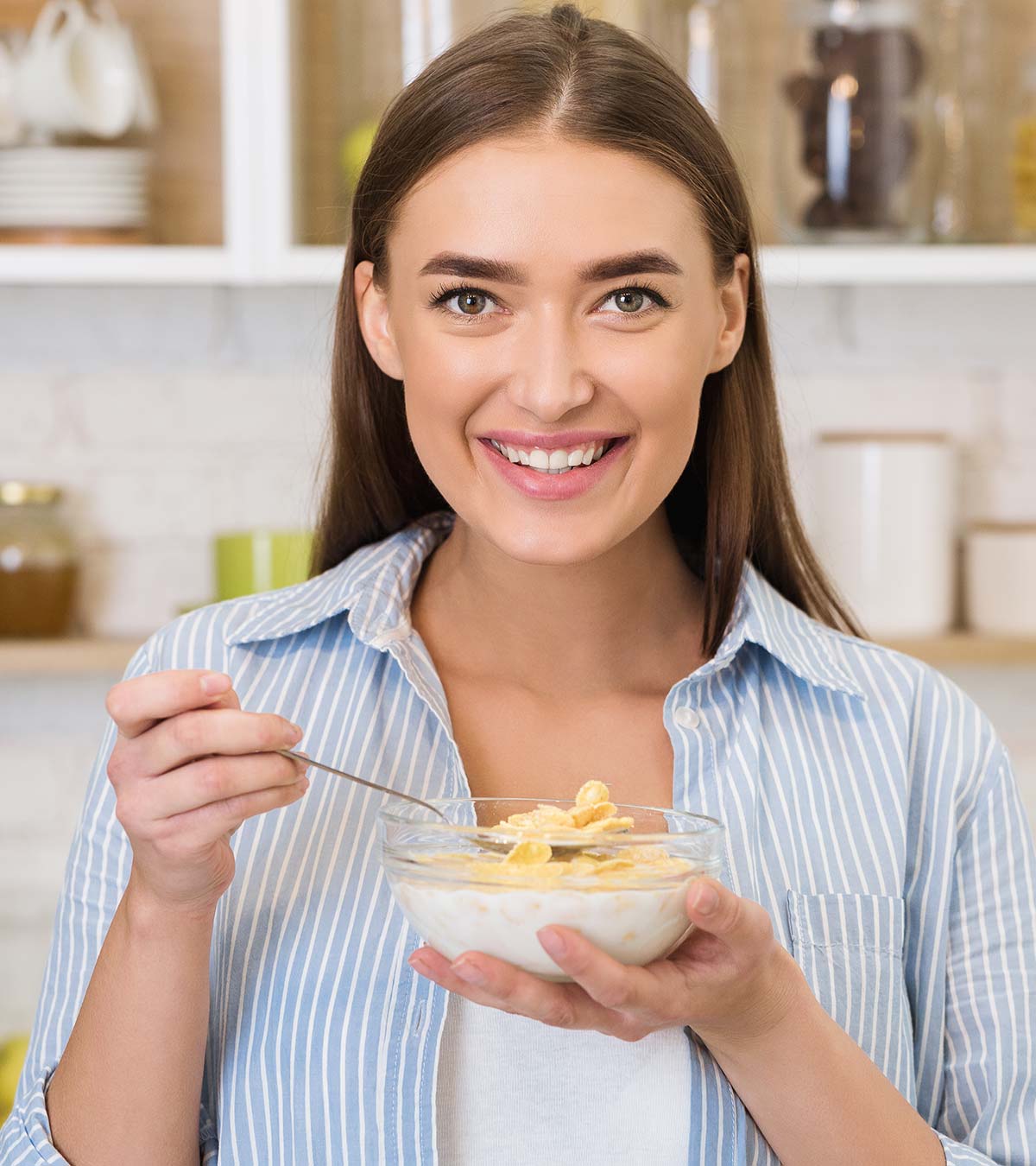 A lady eating oatmeal