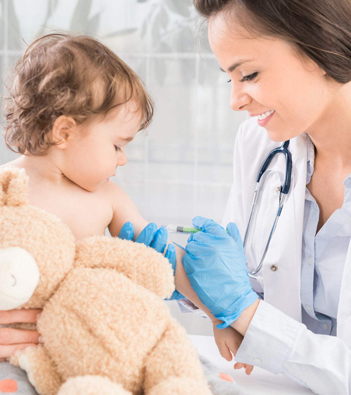 Doctor Giving Vaccination For baby