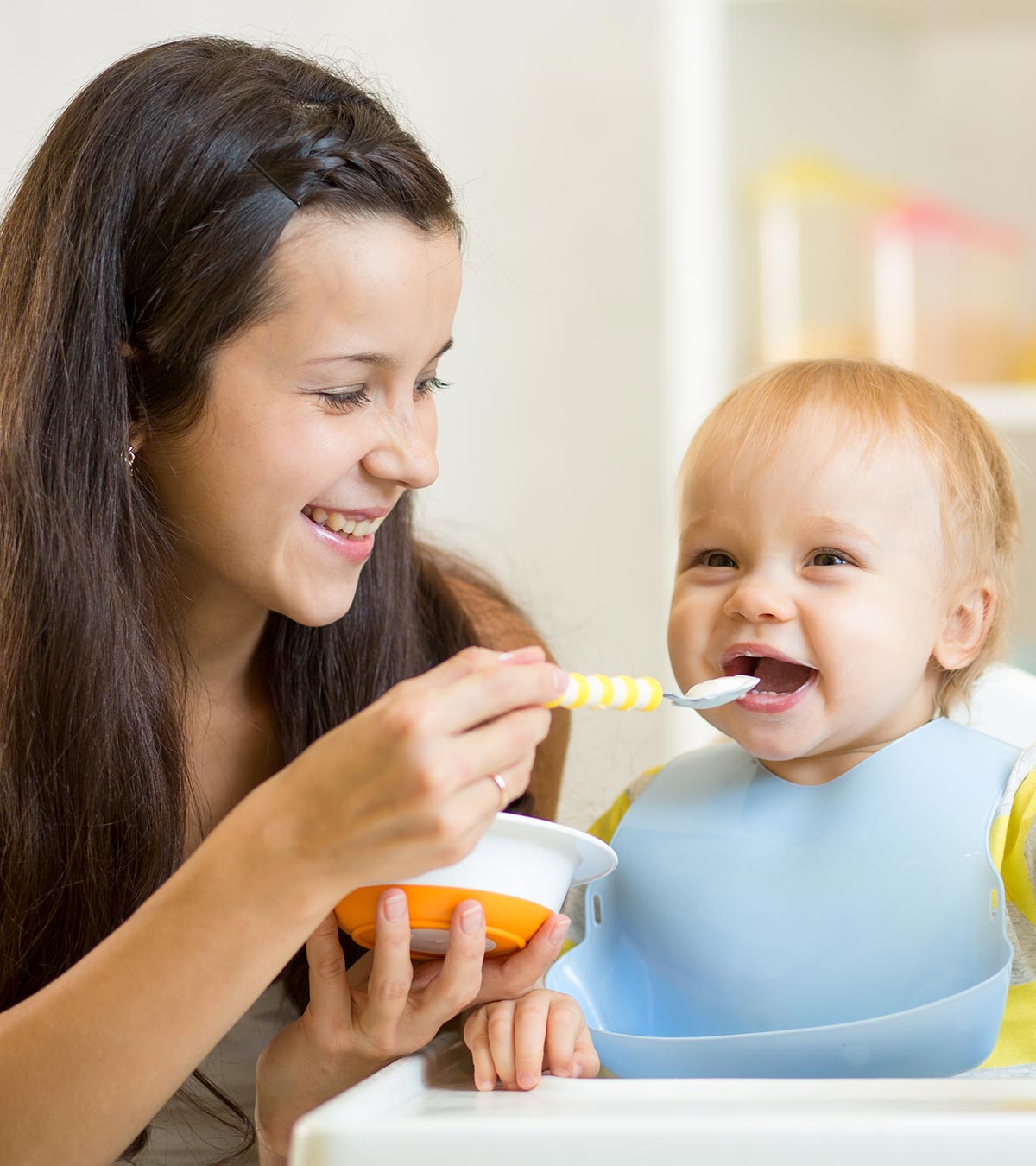 A mother feeding her baby